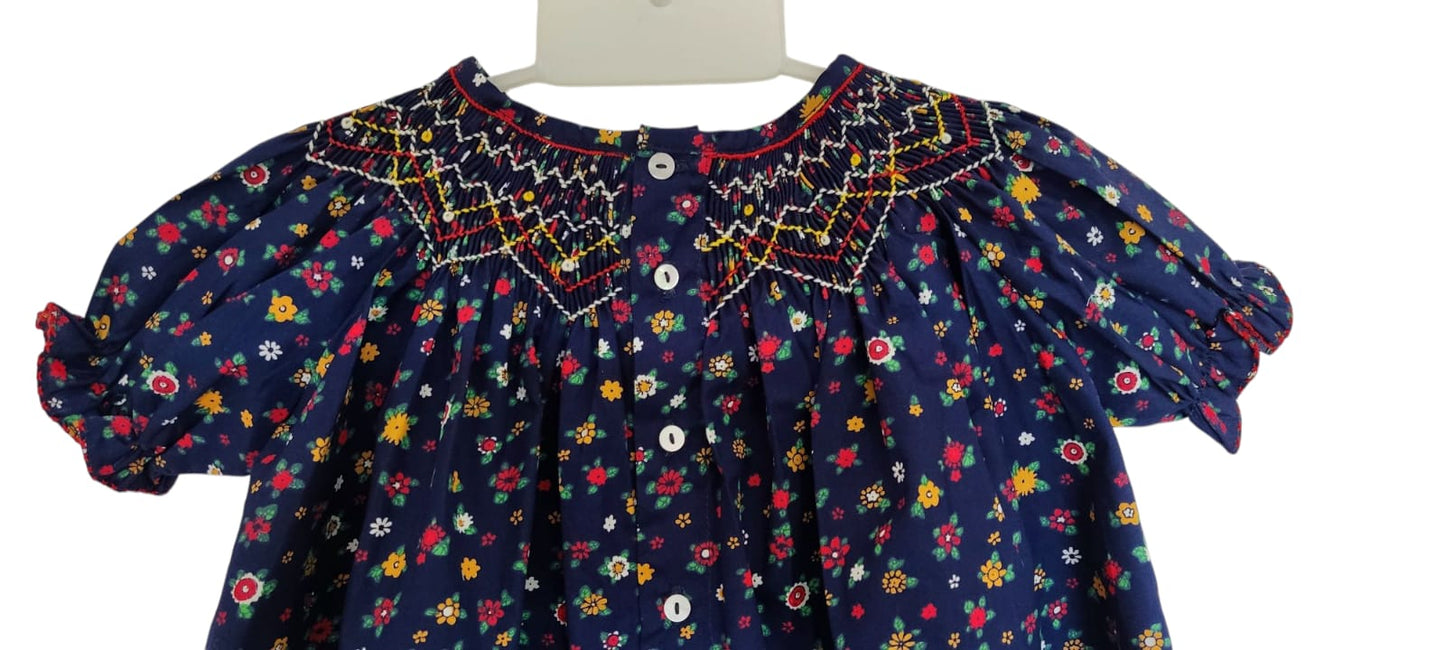 Blouse imprimée fleuri bleu marine. 1 an