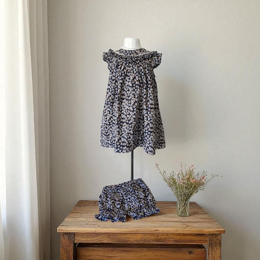 Ensemble tunique et bloomer fleurie. 1 an