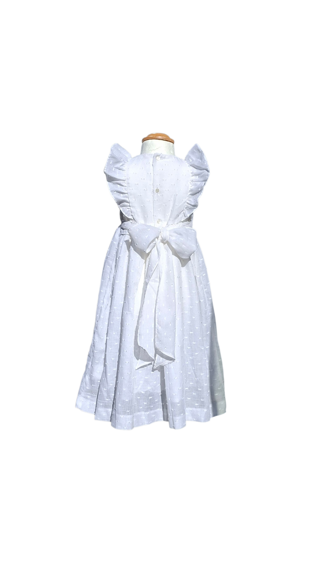 Robe de cérémonie. Robe blanche en plumetis.
