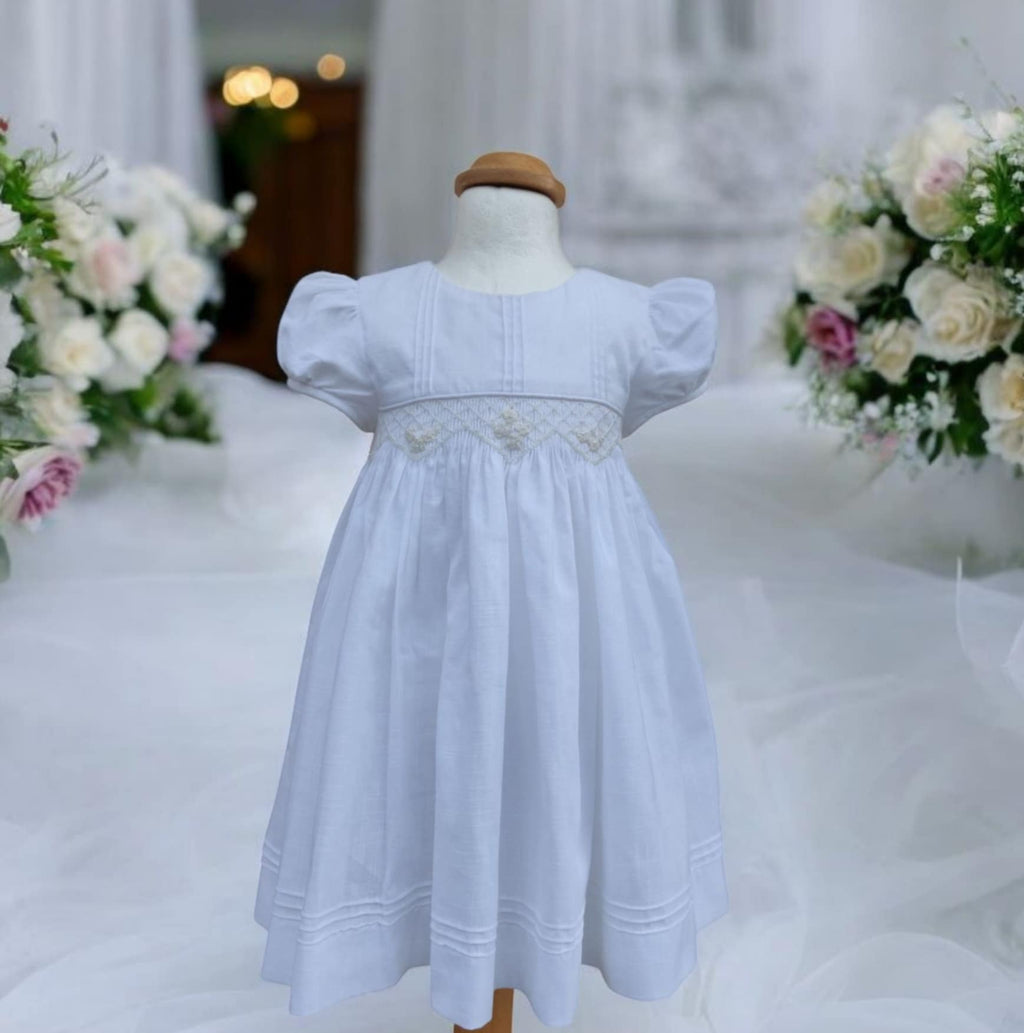 Magnifique Robe smockée pour cérémonie en coton et en lin.