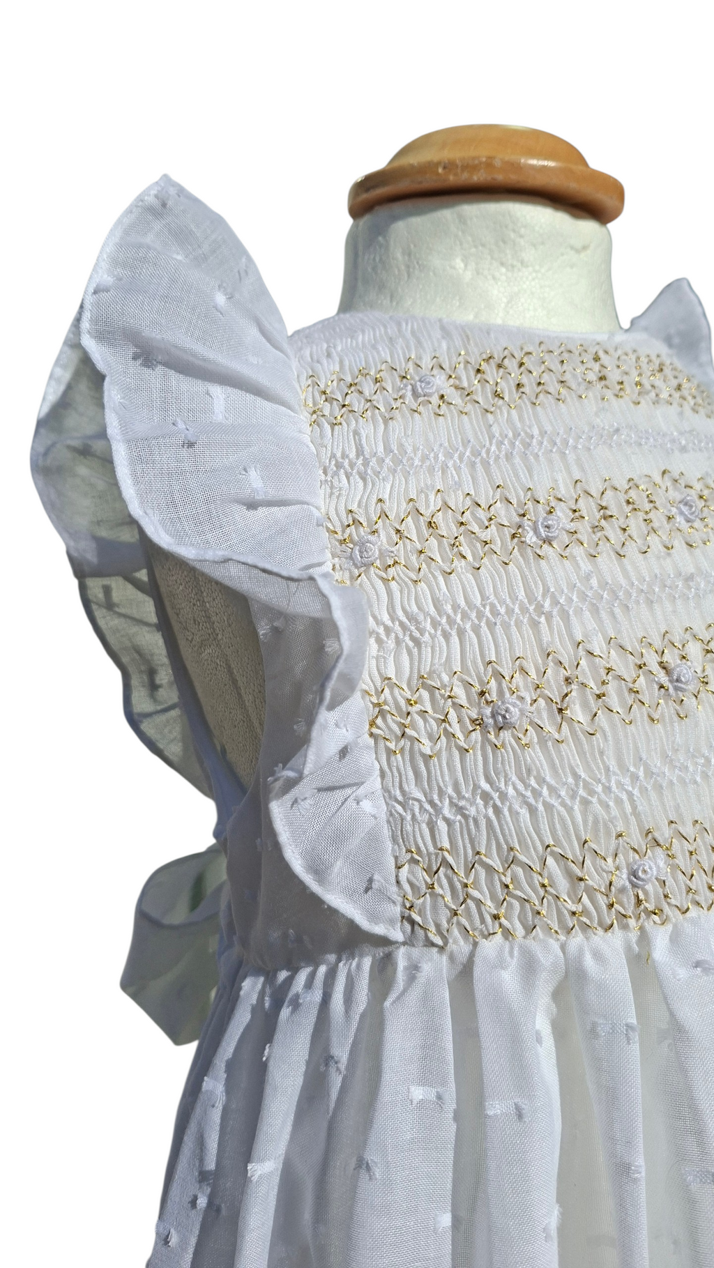 Robe de cérémonie. Robe blanche en plumetis.