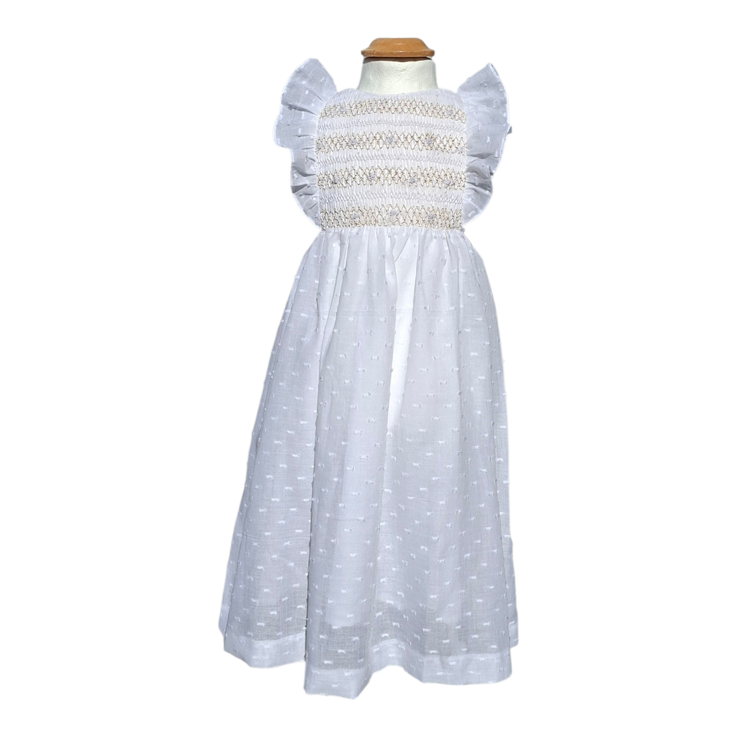 Robe de cérémonie. Robe blanche en plumetis.