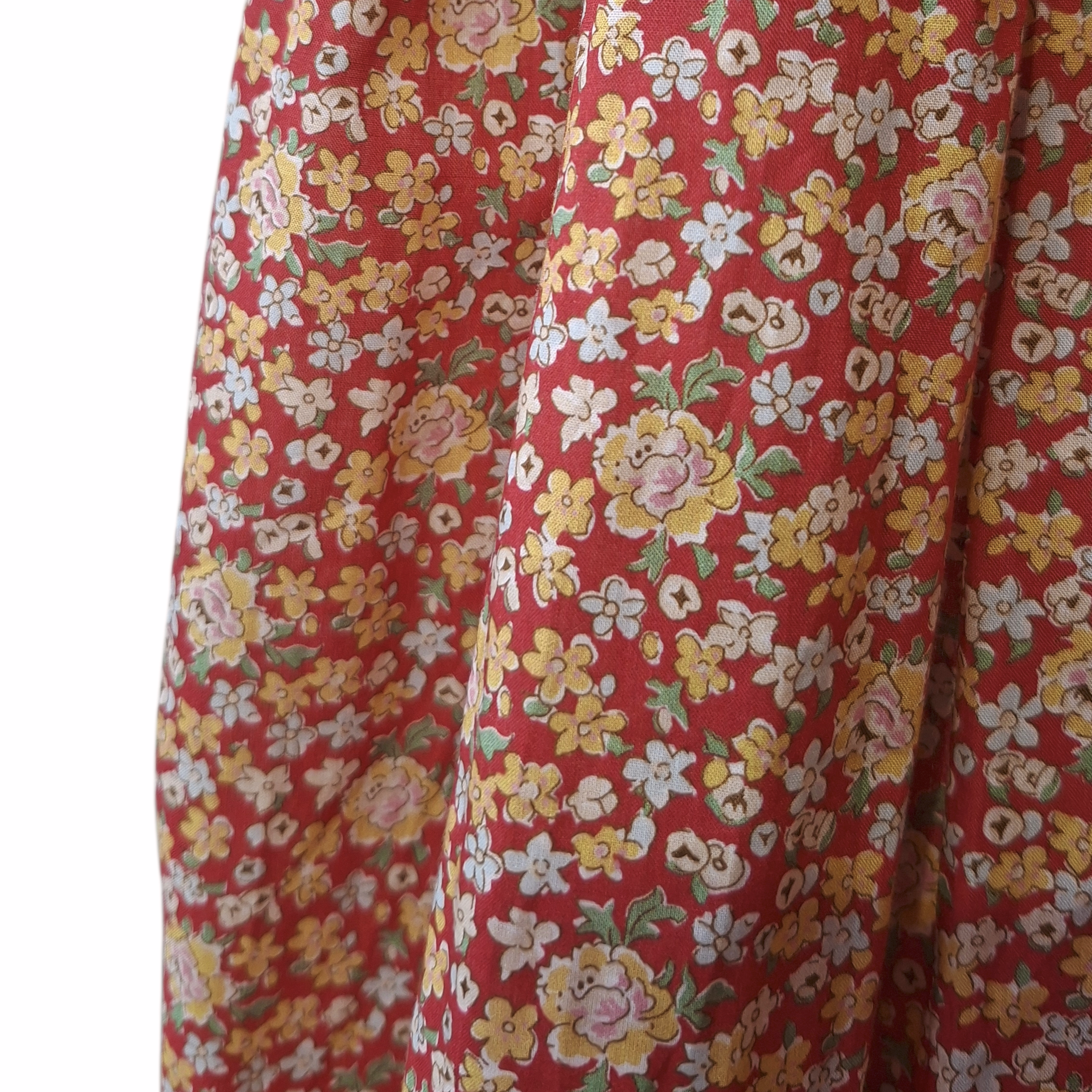 Robe à smocks orange fleuri multicolore. Tissu Goldina dress.