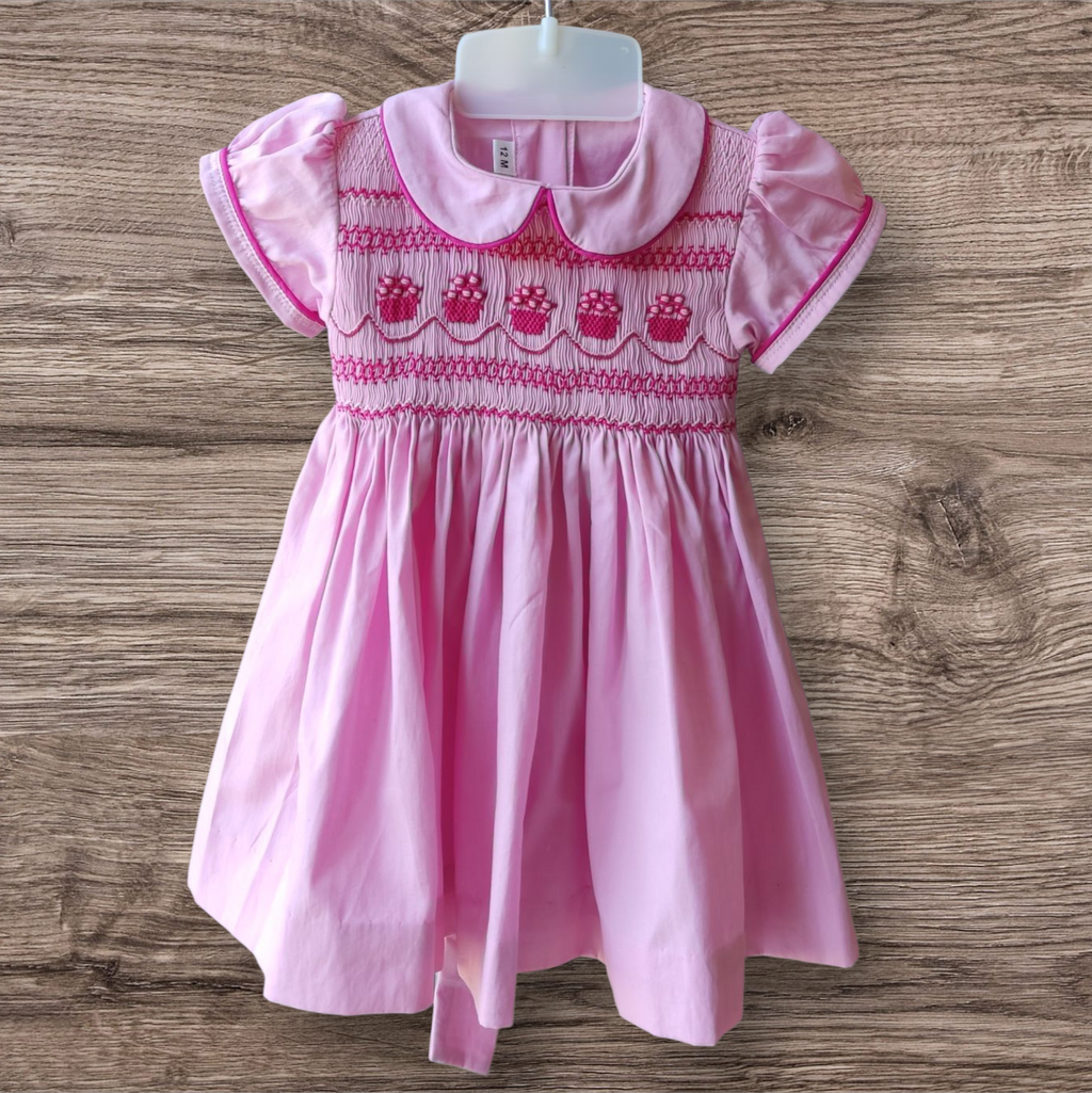 Robe à smocks rose 1 an. Robe bébé fille