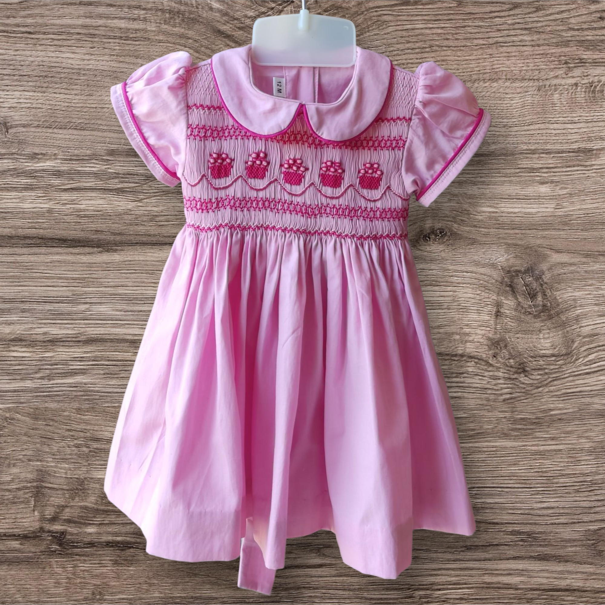 Robe à smocks rose 1 an. Robe bébé fille