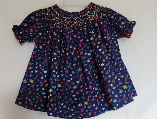 Blouse imprimée fleuri bleu marine. 1 an